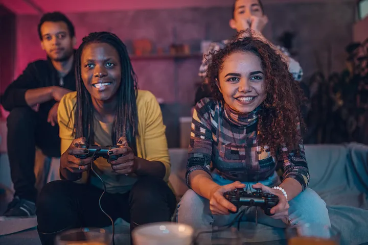 a group of young people playing video games